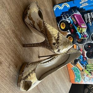 Fun, gold, snake skin heels!